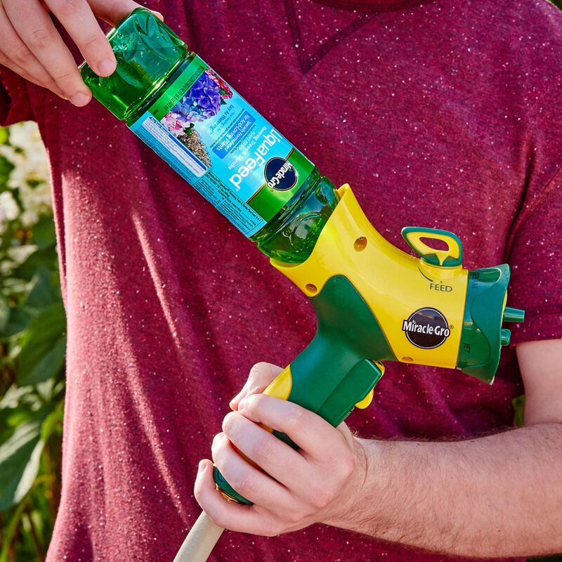 Miracle-Gro&reg; LiquaFeed All Purpose Plant Food Advance Starter&reg; Kit and Bloom Booster Flower Food Bundle image number null